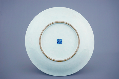 A large blue and white lotus scroll dish, Qianlong mark and of the period