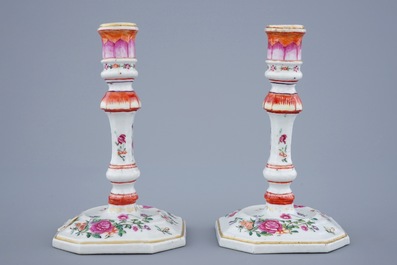A pair of Chinese famille rose candlesticks, Qianlong, 18th C.