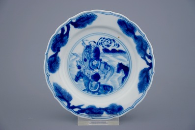 A set of 6 Chinese blue and white saucers with horseriders, Kangxi