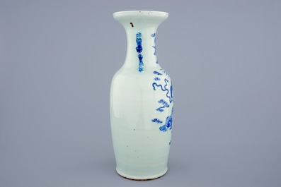 A Chinese blue and white on celadon ground porcelain vase with foo dogs, 19th C.