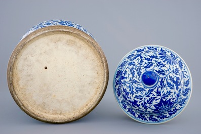 A Chinese blue and white vase and cover with lotus scrolls, 19th C.