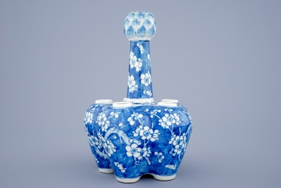 A Chinese blue and white tulip vase with prunus design, 19th C.