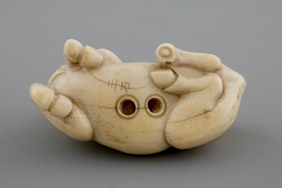 A signed Japanese ivory netsuke of a horse, 19th C.