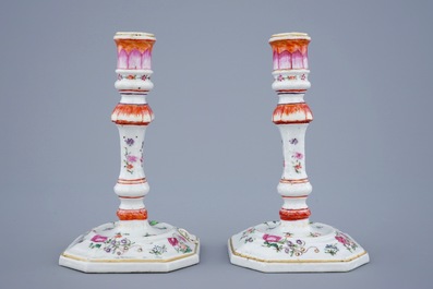 A pair of Chinese famille rose candlesticks, Qianlong, 18th C.