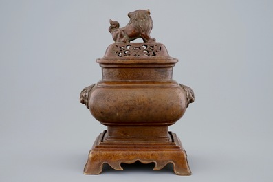 A Chinese bronze censer on stand with engraved design, 18/19th C.