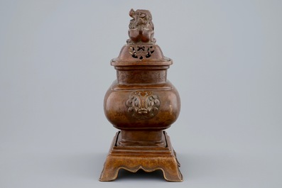 A Chinese bronze censer on stand with engraved design, 18/19th C.