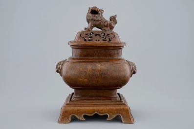 A Chinese bronze censer on stand with engraved design, 18/19th C.