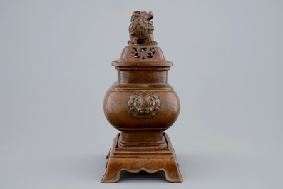 A Chinese bronze censer on stand with engraved design, 18/19th C.