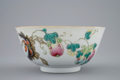 A Chinese famille rose vase with applied flowers and a bowl, 19th C.