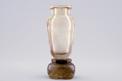 A Chinese rock crystal vase with bats, 19th C.