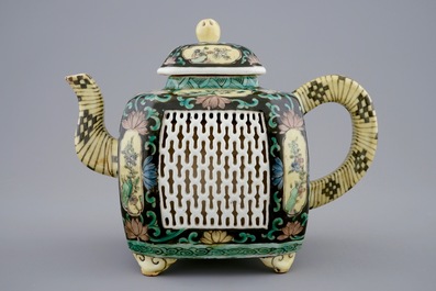 A double-walled reticulated Chinese famille noire teapot, 18/19th C.