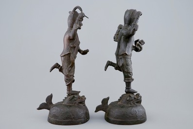 A pair of Chinese bronze mythological figures, Ming Dynasty