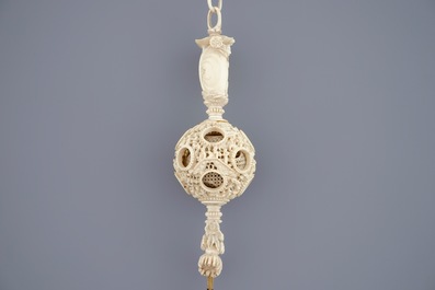 A hanging Chinese ivory puzzle ball, Canton, 19th C.