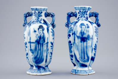 A pair of small Chinese blue and white vases with long Elizas, Kangxi