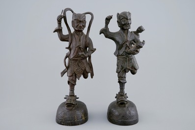 A pair of Chinese bronze mythological figures, Ming Dynasty