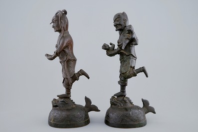 A pair of Chinese bronze mythological figures, Ming Dynasty