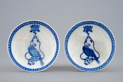 A pair of Chinese blue and white cups and saucers with &quot;The parrot on the perch&quot;, Qianlong, 18th C.