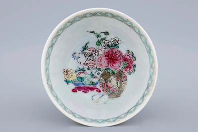 A Chinese famille eggshell rose cup and saucer with a central flowervase, Yongzheng, 1723-1735