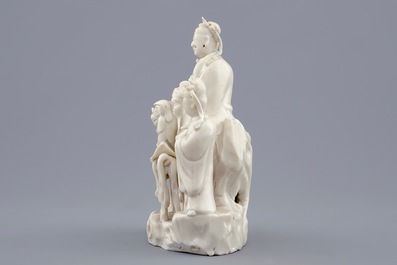 A Chinese Dehua blanc de Chine group of Wen Chang with 2 followers, 18/19th C.