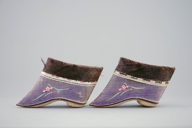 A pair of Chinese embroidered lotus shoes, 19/20th C.