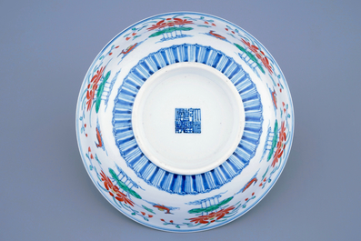 A Chinese doucai &quot;Lotus pond and mandarin ducks&quot; bowl, Qianlong sealmark and poss. of the period