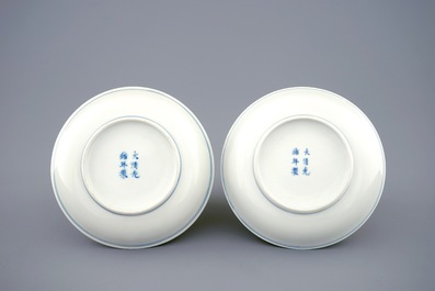 A pair of Chinese blue, white and iron red plates with bats among clouds, Guangxu mark and of the period