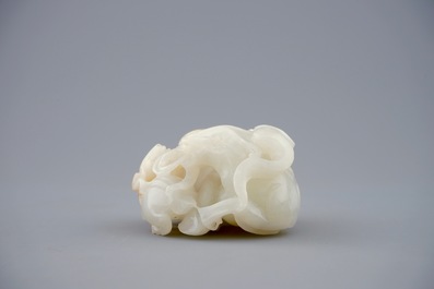 A Chinese white jade carving of a &quot;Three rams&quot; group, 19/20th C.