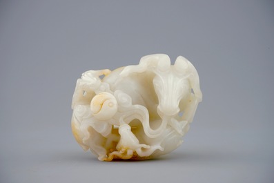 A Chinese white jade carving of a &quot;Three rams&quot; group, 19/20th C.