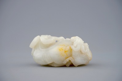 A Chinese white jade carving of a &quot;Three rams&quot; group, 19/20th C.