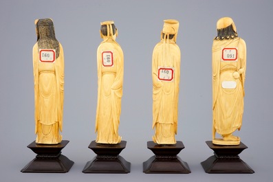 A set of 8 fine Chinese carved ivory immortals on wooden bases, 19th C.