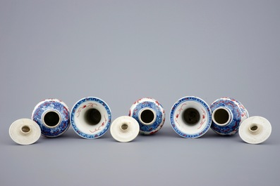 A small Chinese partly clobbered blue and white five piece garniture, Qianlong, 18th C.