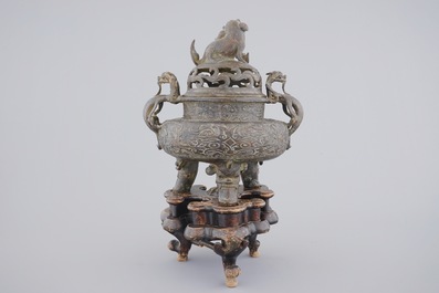 A large Chinese bronze tripod censer on stand, 17/18th C.