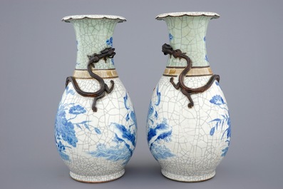 A pair of Chinese blue and white on crackle and celadon ground vases, 19th C.