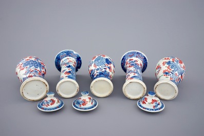 A small Chinese partly clobbered blue and white five piece garniture, Qianlong, 18th C.