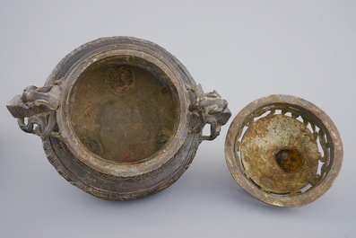 A large Chinese bronze tripod censer on stand, 17/18th C.