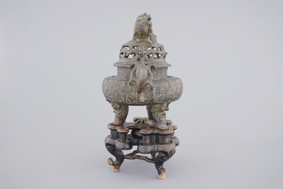 A large Chinese bronze tripod censer on stand, 17/18th C.