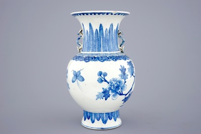 A Chinese blue and white vase with ruyi handles and a Kangxi-style plate, 19th C.