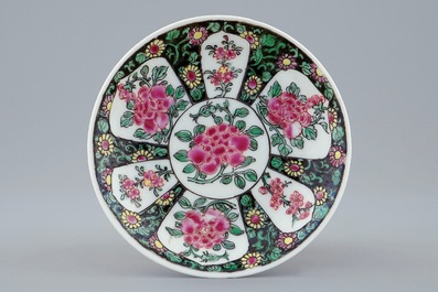 A Chinese famille noire cup and saucer, Yongzheng, 1723-1735