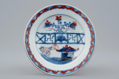 A Chinese Imari style cup and saucer with a parrot, Qianlong, 18th C.