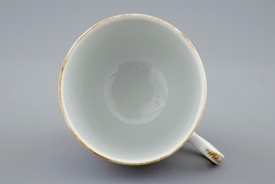 A Chinese famille rose armorial cup and saucer, Qianlong, 18th C.