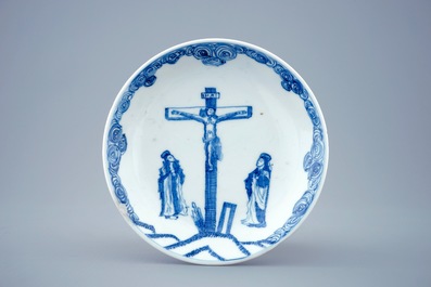 A blue and white Chinese cup and saucer with &quot;The crucifixion&quot;, Kangxi