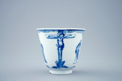 A blue and white Chinese cup and saucer with &quot;The crucifixion&quot;, Kangxi