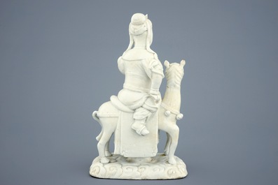 A Chinese Dehua blanc de Chine model of Guandi, God of War, on horse, Ming Dynasty, Chongzhen (1627&ndash;1644)