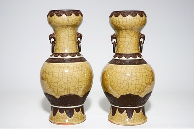 A pair of Chinese crackle glazed caf&eacute; au lait ground Nanking vases, 19th C.
