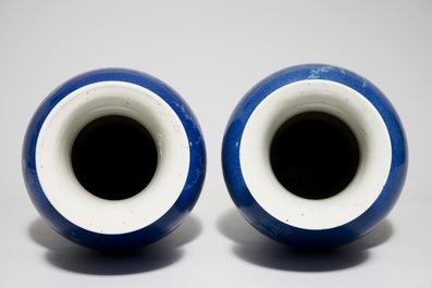 A pair of Chinese powder blue ground vases with incised decoration, 19th C.