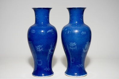 A pair of Chinese powder blue ground vases with incised decoration, 19th C.