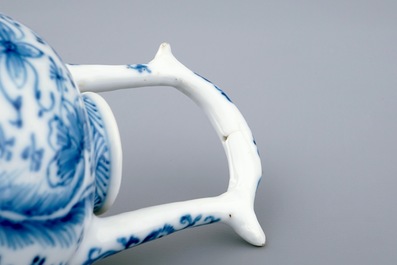 A small Chinese blue and white gate-handled teapot and cover, Kangxi