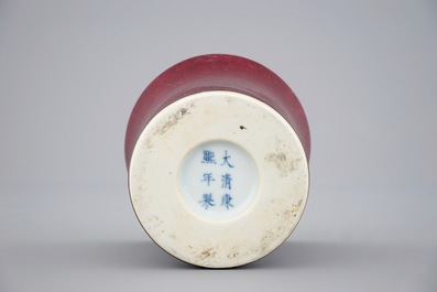 A Chinese monochrome liver-red waisted brush pot, Kangxi mark and of the period