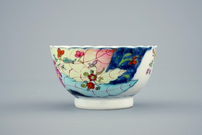 A set of 5 Chinese famille rose cups and 3 saucers with &ldquo;tobacco leaf&rdquo; design, Qianlong, 18th C.