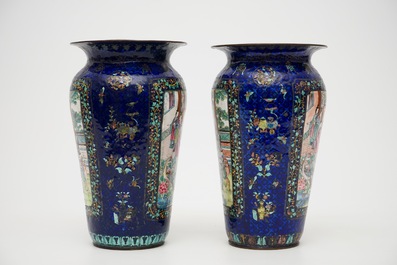 A pair of Chinese blue ground Canton enamel vases, 19th C.